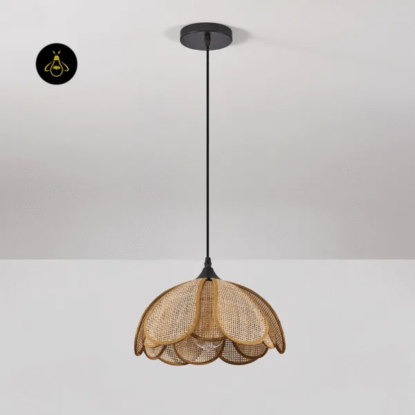 Unlit flower pendant light in natural rattan cane on a black cord and round black ceiling canopy