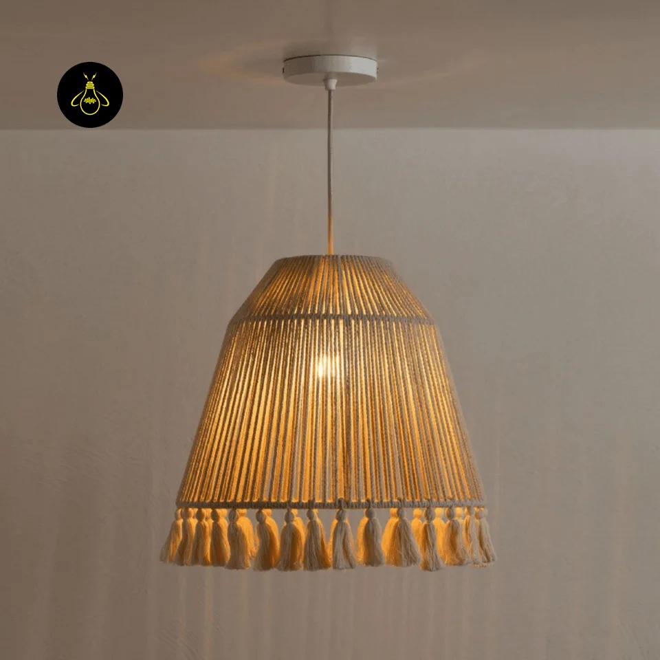 Tassel Pendant Light – Handwoven Hemp Rope Bell Shade, 41 cm 2 Lit hemp rope tassel pendant light casting a warm glow over a living room