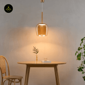 Amber glass bell pendant over a dining table