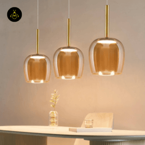 Amber bell pendant lighting a dining table setting