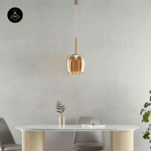Amber bell pendants suspended over a dining table
