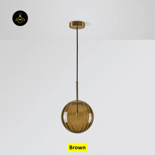Brown globe hanging light switched off, ribbed brown borosilicate glass under a brushed gold canopy