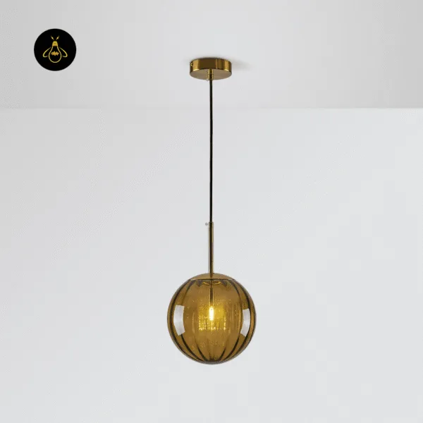 Brown globe hanging light switched on, ribbed brown borosilicate glass with a warm glow