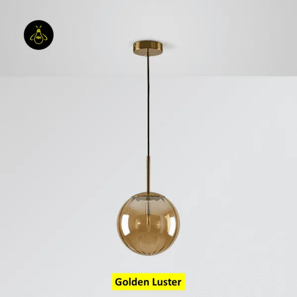 Gold-lustre globe hanging light switched off, ribbed glass ball on a black cord