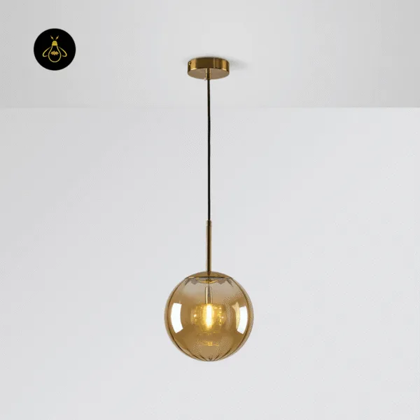 Gold-lustre globe hanging light switched on, borosilicate glass on a brushed gold stem