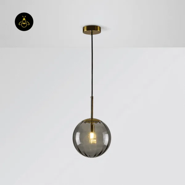 Smoked globe hanging light switched on, ribbed smoked borosilicate glass with a soft glow