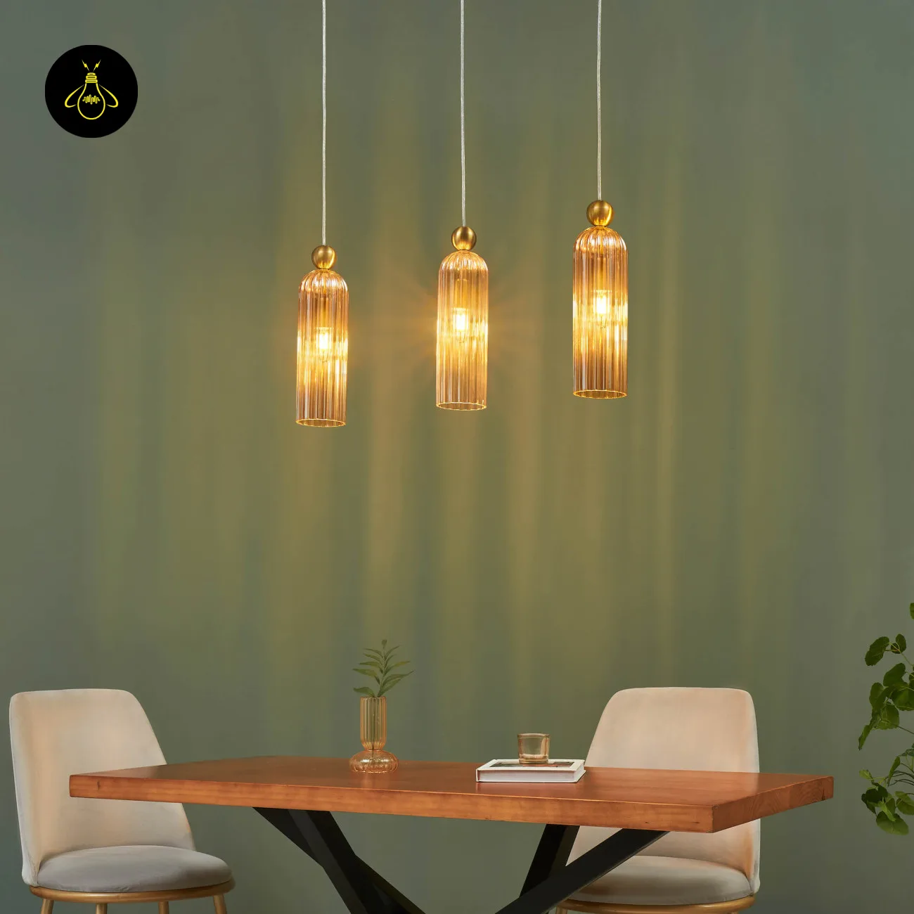 Amber Fluted Glass Pendant Light – Gold | Leonora 8 Leonora amber fluted glass pendant light illuminated – warm amber glow dining room