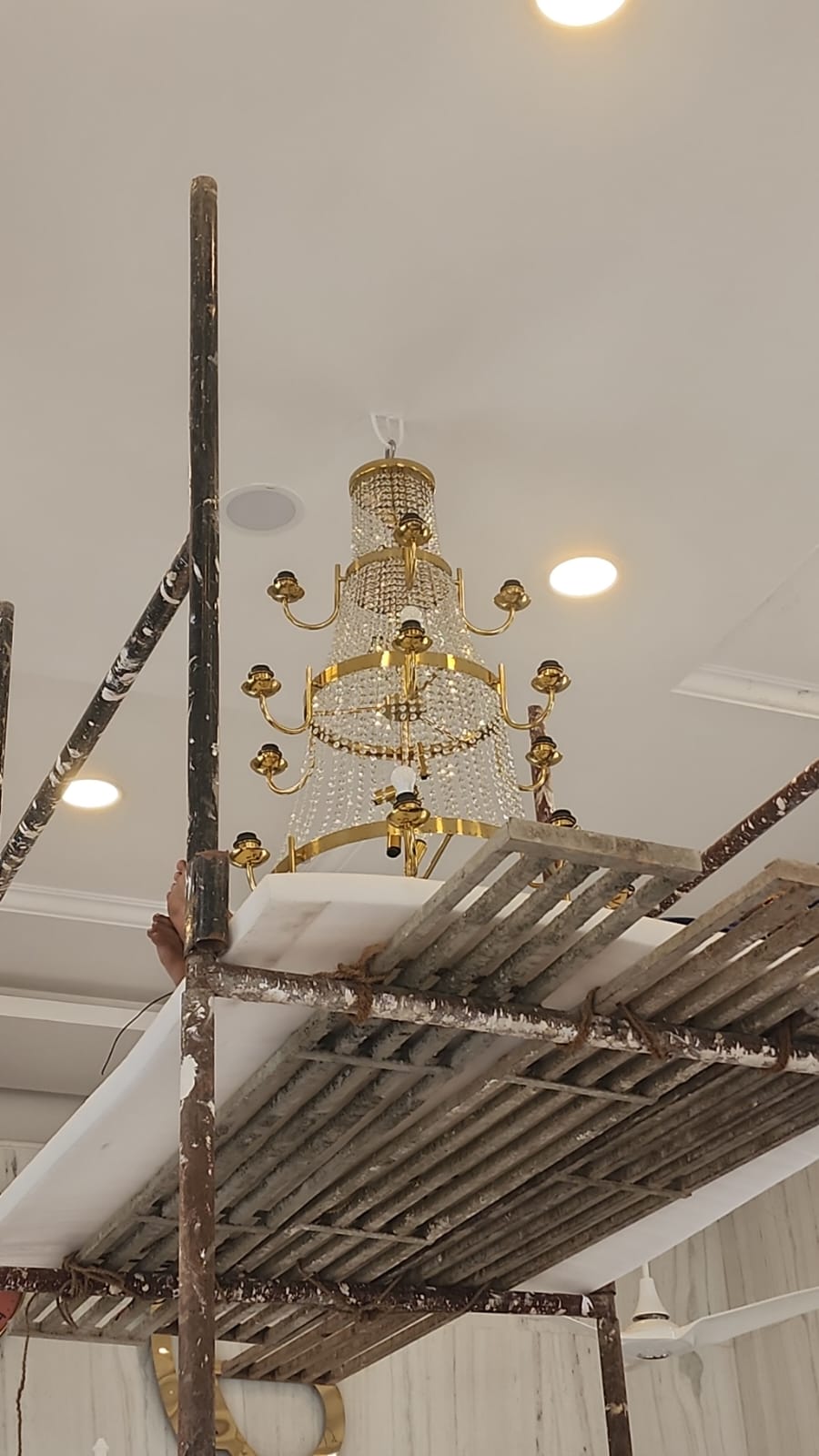 Religious interior lighting project showing Maharaja chandeliers in a Gurudwara