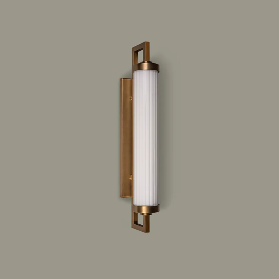 Fluted Glass Vanity Light – Satin Brass Tube Sconce, 45 cm 1 Fluted glass vanity light in satin brass with a ribbed opal-white tube shade, front view