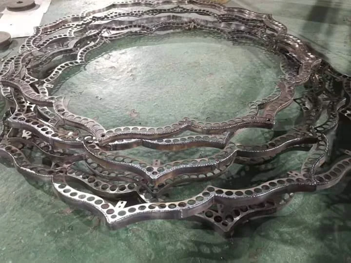 Raw metal fabrication frame for a custom banquet chandelier at Silver Oak Hotel and Banquet Kanyakumari