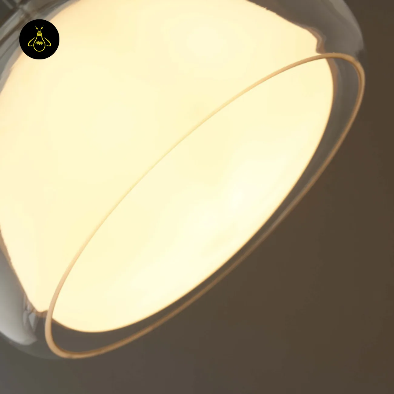 Double Glass Pendant Light – Lomelia 25 cm Dome, Gold Finish 18 Close-up from below of the Lomelia double glass pendant light, lit opal borosilicate inner shade inside the clear outer rim