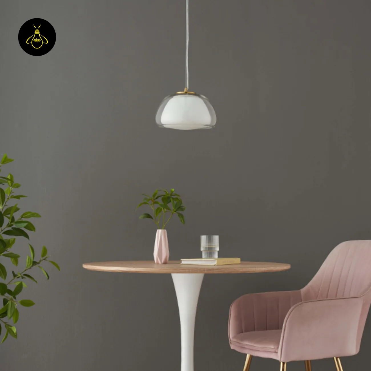 Double Glass Pendant Light – Lomelia 25 cm Dome, Gold Finish 12 Lomelia double glass pendant light unlit over a round wooden table with a pink velvet armchair against a grey wall