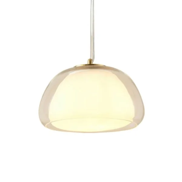 Lomelia double glass pendant light lit on a white background, champagne borosilicate outer dome over an opal inner shade with a gold-finish stainless steel cap