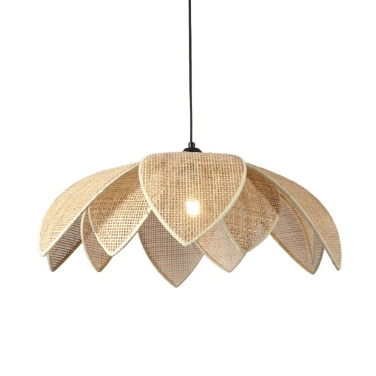 Cane pendant light with a lotus shade of handwoven cane petals on a black cord, front view on white