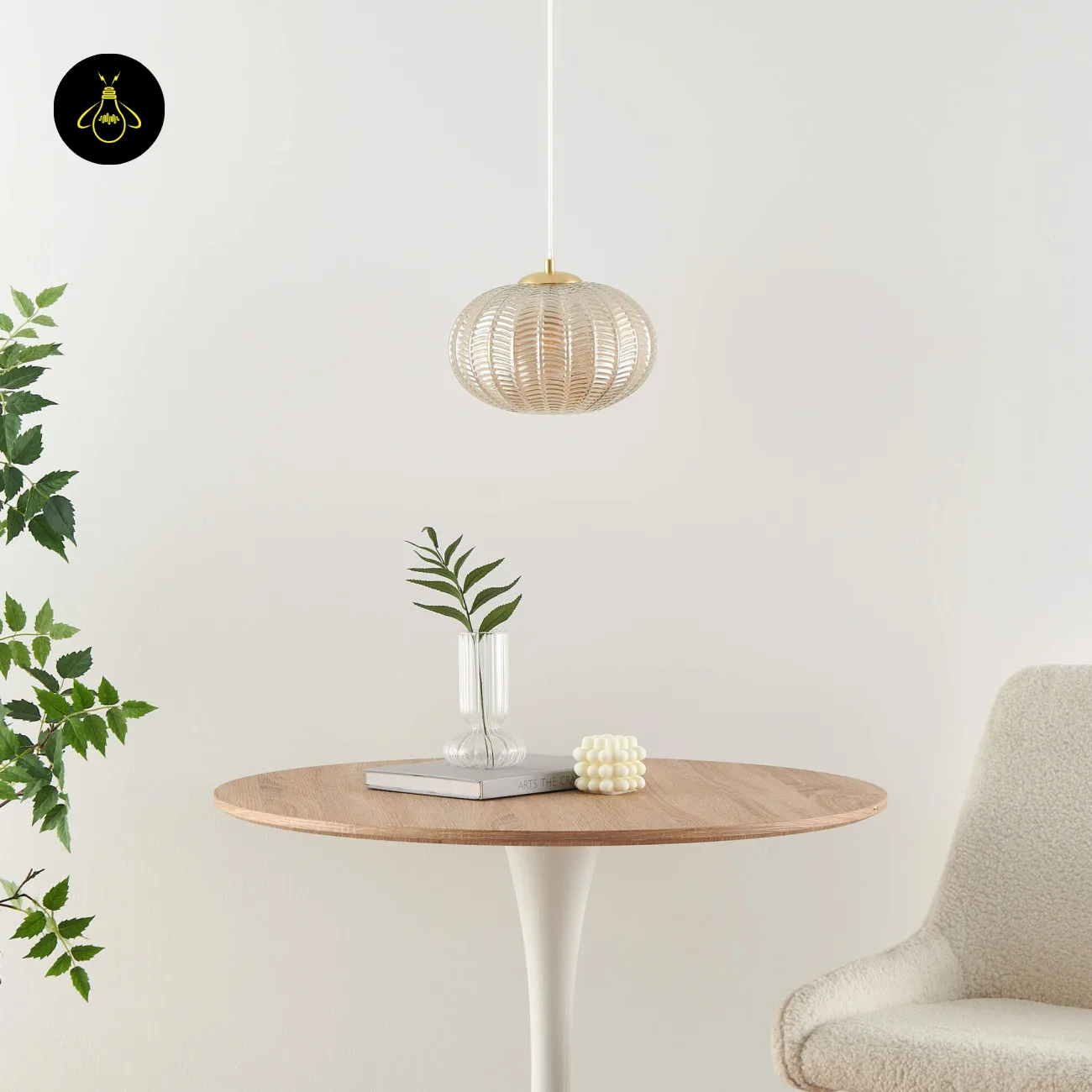 Textured Amber Glass Pendant Light – 26 cm Globe, Brass Finish, E27 13 Textured glass pendant light, unlit, above a round wooden table and a cream chair