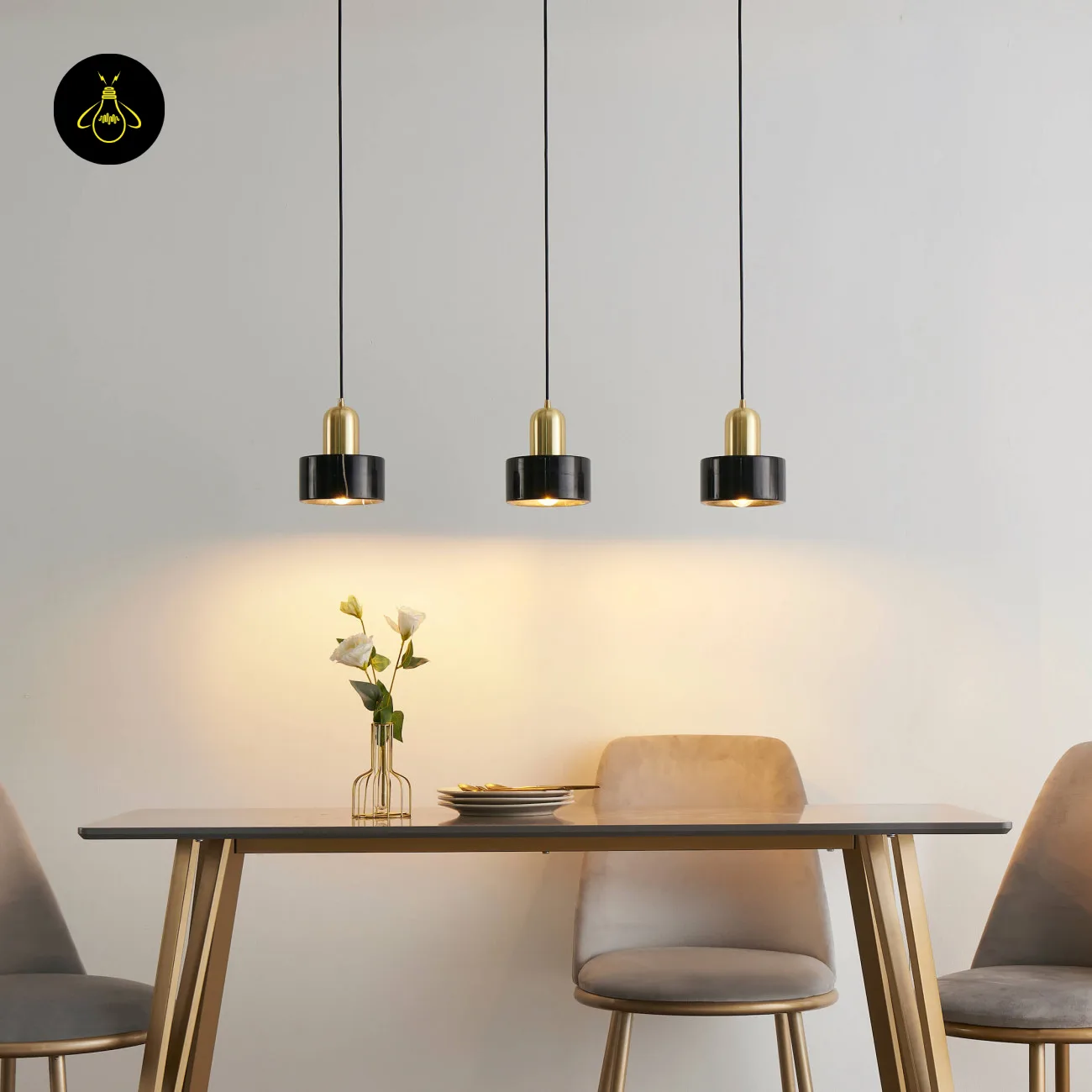 Black Marble Pendant Light – Meryl | 15 cm Marble Hanging Light with Gold Cap 6 Three marble hanging lights over a grey dining table with velvet chairs