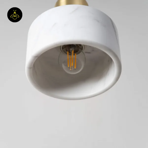 Bottom view of the marble light: E27 holder with a filament bulb inside the white marble shade (bulb not included)