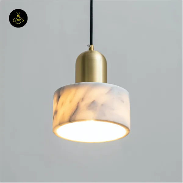 Marble light lit from inside: the warm glow brings out the grey veins of the white marble shade