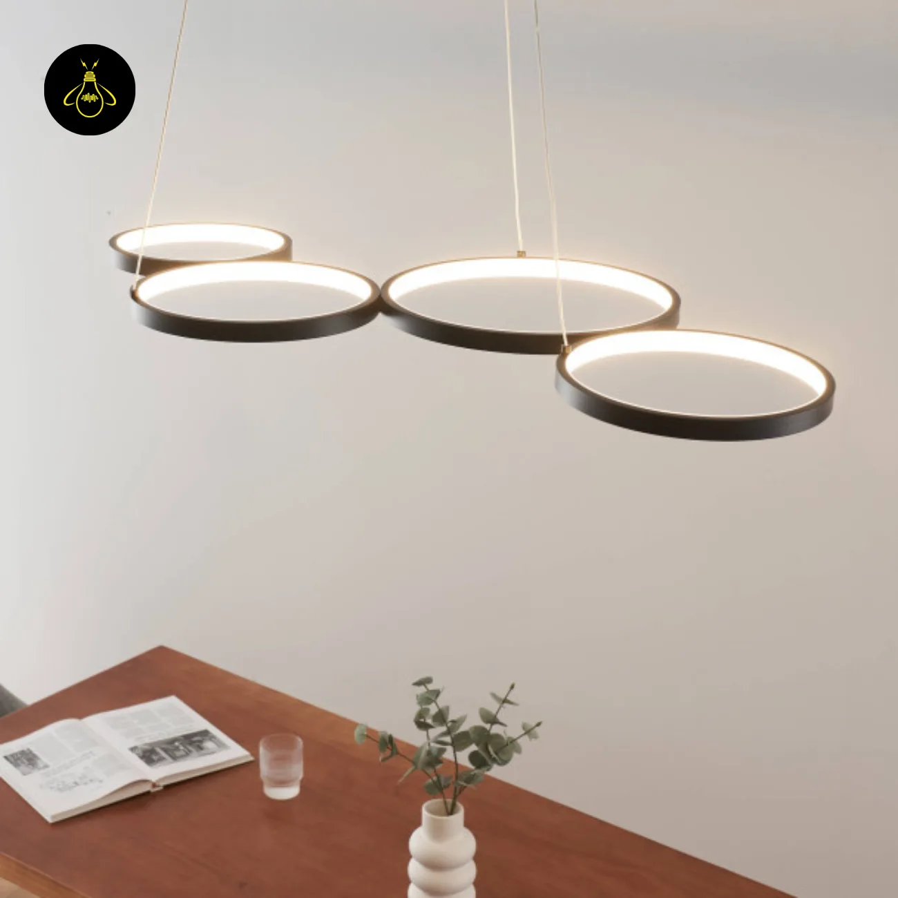 Black Ring Chandelier – Newton 4-Ring LED, 88 cm 4 Black ring chandelier above a dining table