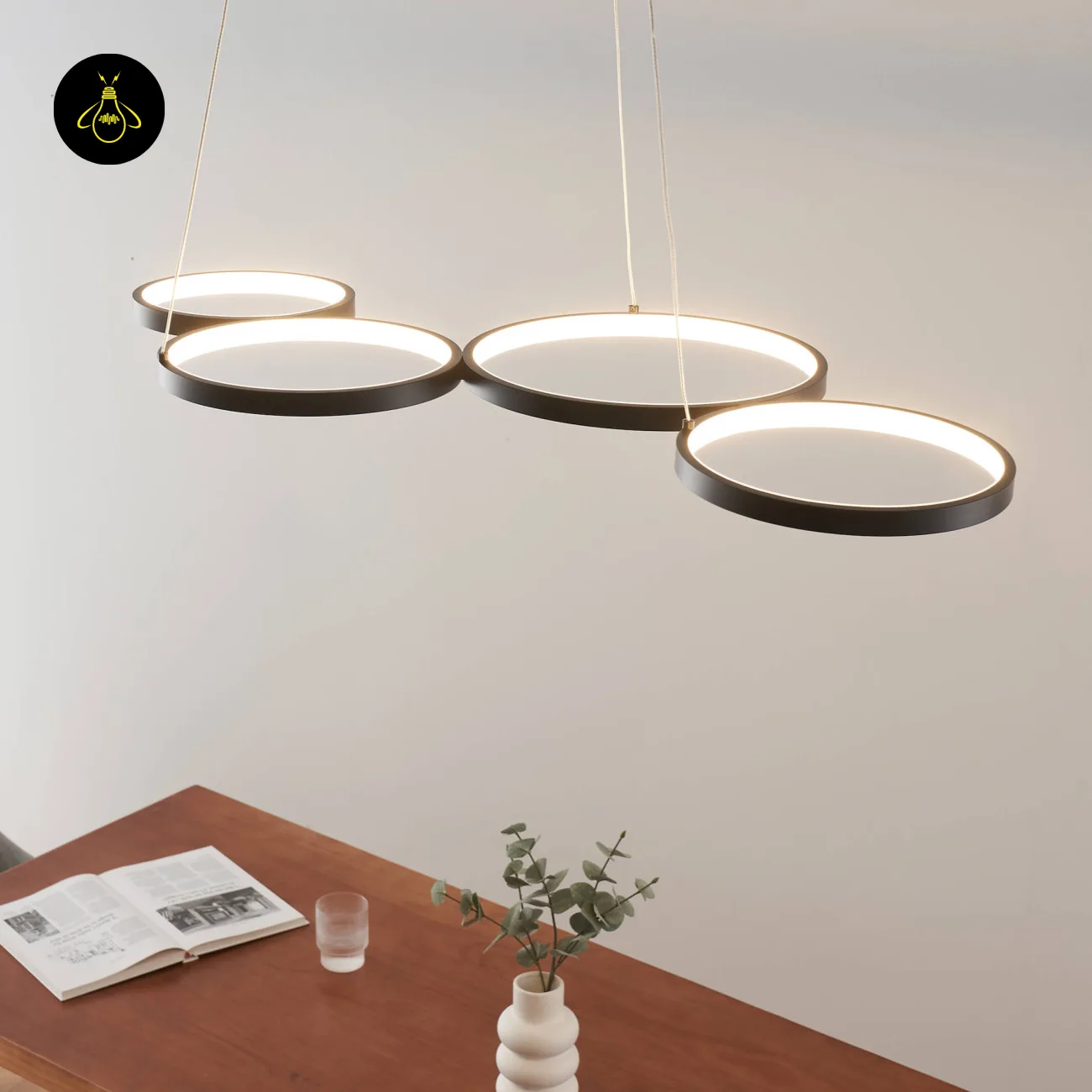 Black Ring Chandelier – Newton 4-Ring LED, 88 cm 7 Black 4-ring LED chandelier in a dining room