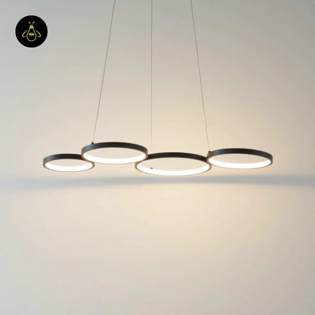 Black Ring Chandelier – Newton 4-Ring LED, 88 cm 5 Black ring chandelier front view while hanging
