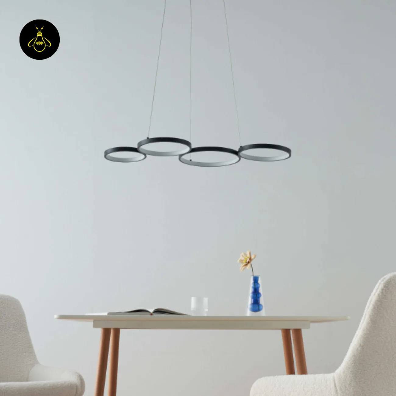 Black Ring Chandelier – Newton 4-Ring LED, 88 cm 11 Newton ring chandelier installed over a dining area