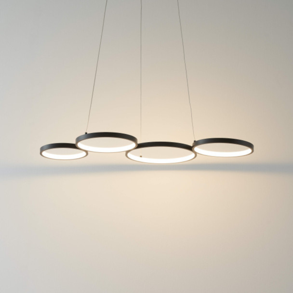Black ring chandelier installed and hanging in a room