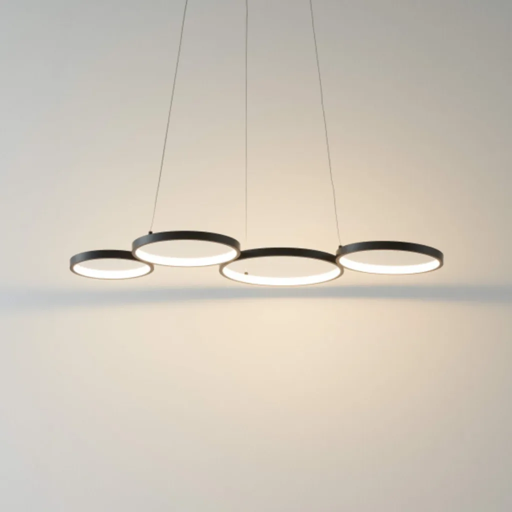 Black ring chandelier installed and hanging in a room