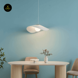 White fabric pendant light Odalia above a dining table