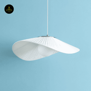 Odalia white fabric pendant light in a living room wall setting