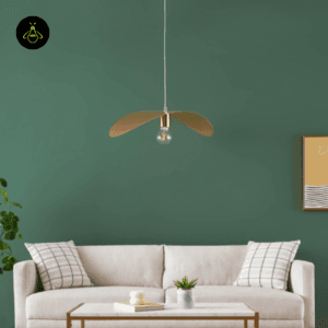 Gold Piuma pendant light over a living room seating area