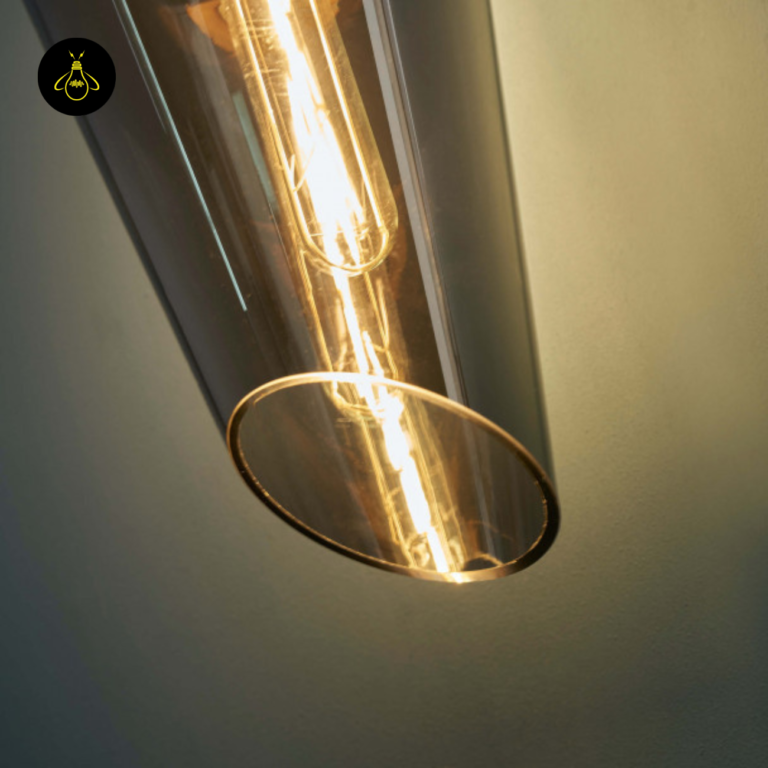 Smoked glass pendant light glass and wood detail with a warm filament bulb