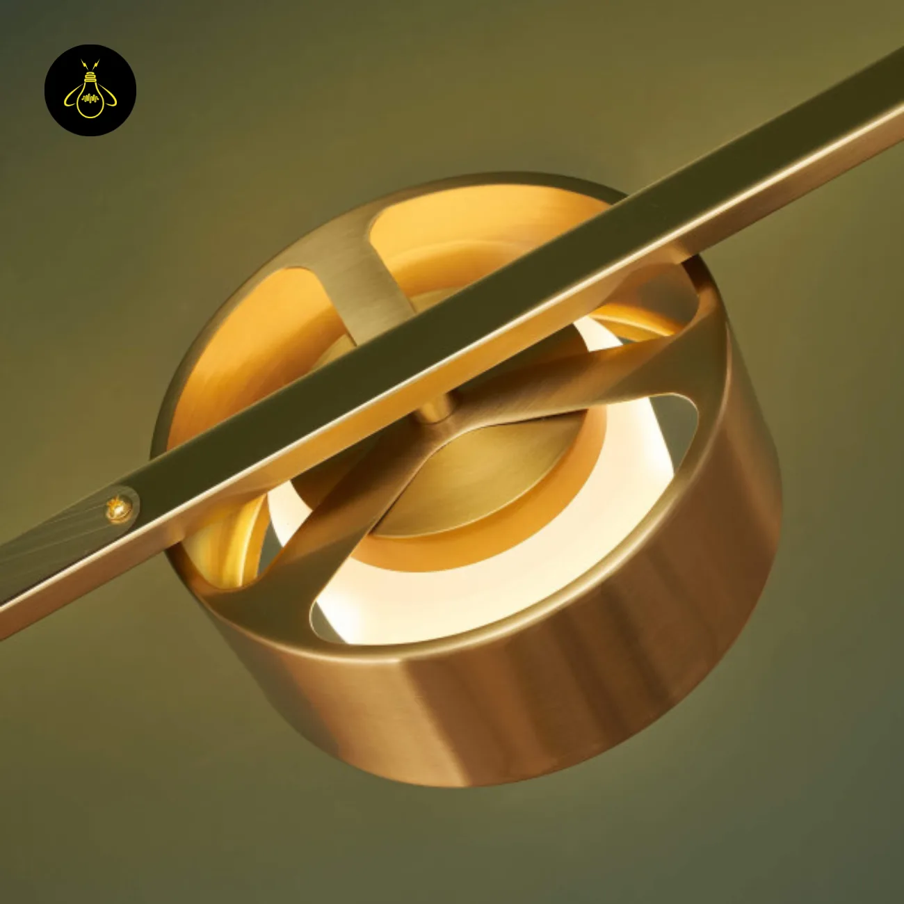 Linear Brass Chandelier – Triple Drum Spots, 108 cm | Jagmag Lights 9 Close-up of brass drum head in aiming ring with integrated LED on a linear chandelier – Jagmag Lights