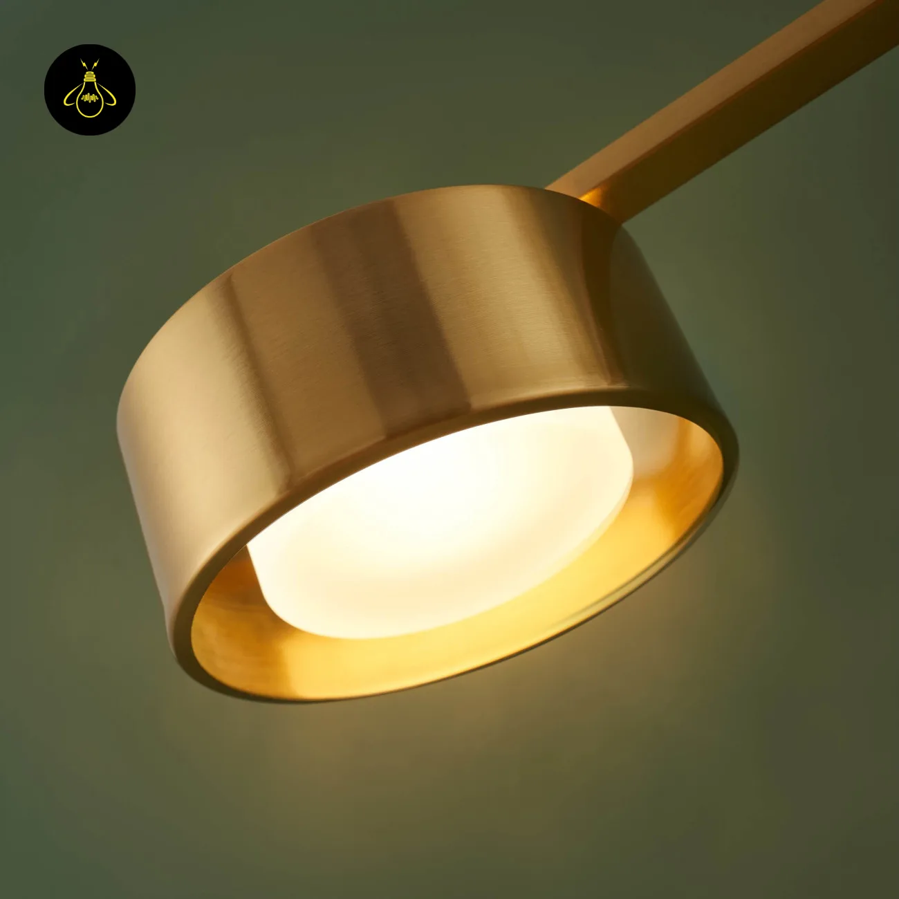 Linear Brass Chandelier – Triple Drum Spots, 108 cm | Jagmag Lights 10 Brushed brass drum head detail showing integrated LED diffuser of a linear chandelier – Jagmag Lights