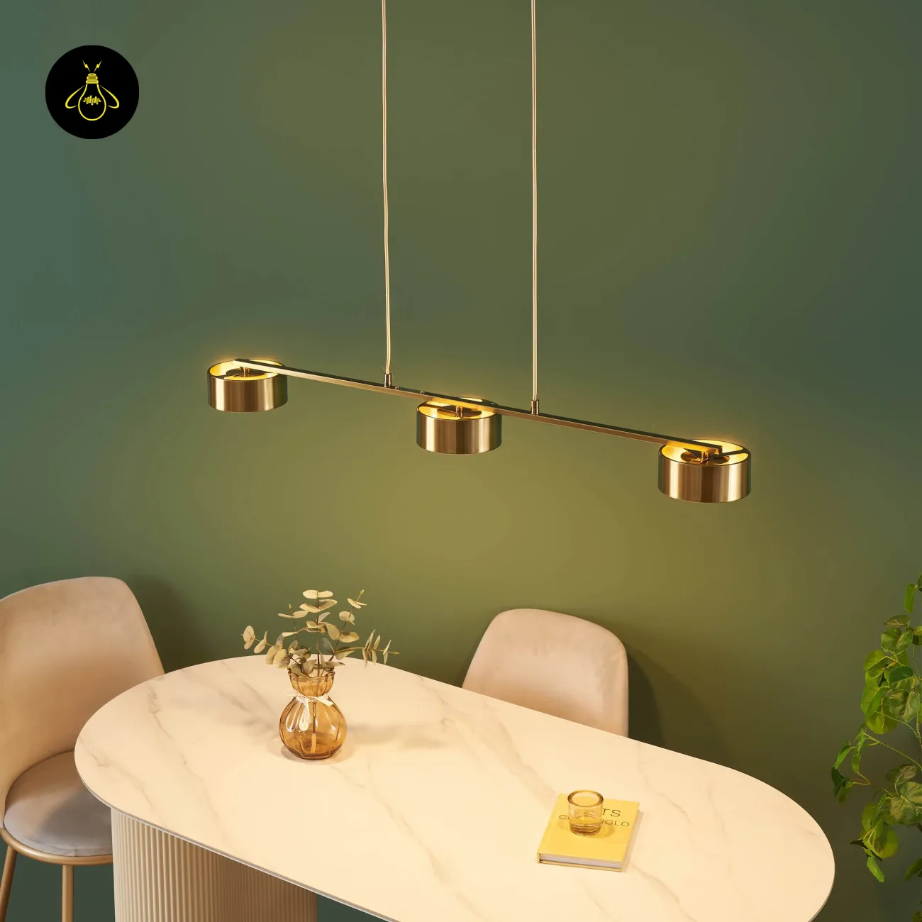 Linear Brass Chandelier – Triple Drum Spots, 108 cm | Jagmag Lights 5 Triple drum LED chandelier casting three pools of light on a dining table – Jagmag Lights
