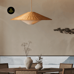 Rattan hat pendant light lit with a warm downward glow through the cream inner diffuser