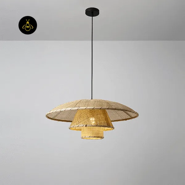 Lit rattan hat pendant light under a matte black canopy: natural handwoven rattan ceiling light brim, cone and drum