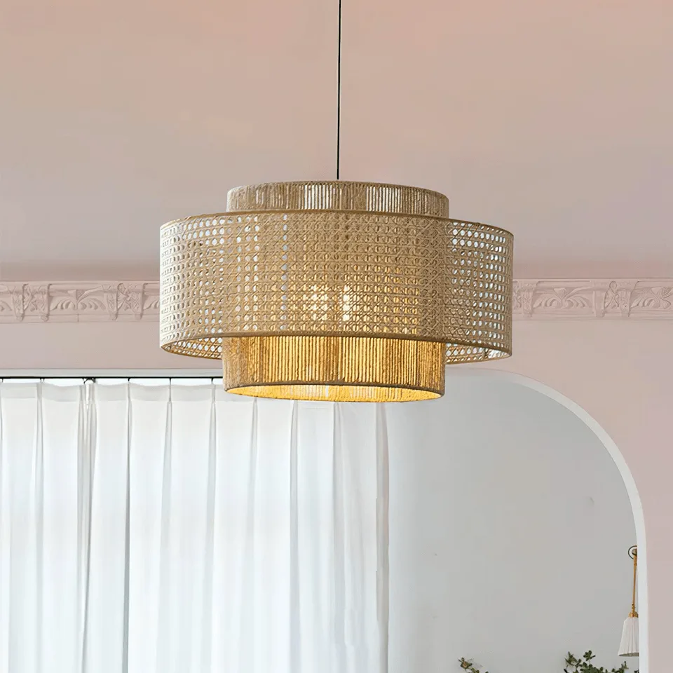 Japanese Rattan Pendant Light – Handwoven 40 cm Layered Drum, 2 Finishes 9 Japanese rattan pendant light installed in a living room, casting a warm dappled glow