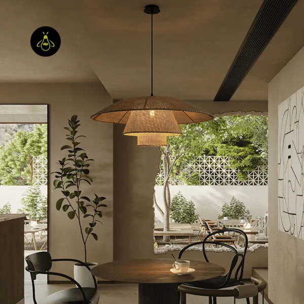 Large rattan ceiling light over a round café table by a garden window