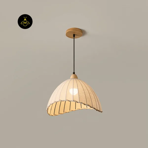 Linen cloth pendant light lit under a round wood ceiling canopy, warm glow through the beige linen dome