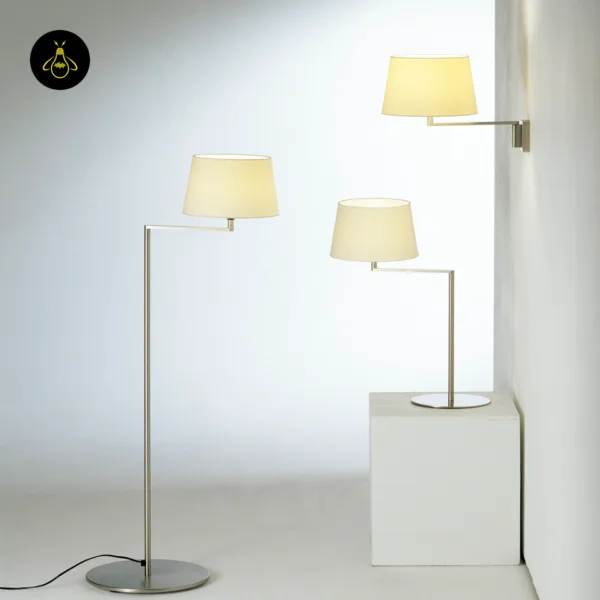 Swing arm wall lamp shown with matching satin nickel floor lamp and table lamp, all with linen shades