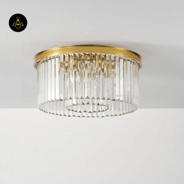 Round satin gold crystal chandelier showing the layered crystal prism design