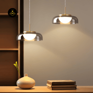 Pair of smoky glass pendant lights over a console in a bedroom