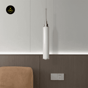 Chrome pendant light installation with adjustable cord and ceiling canopy