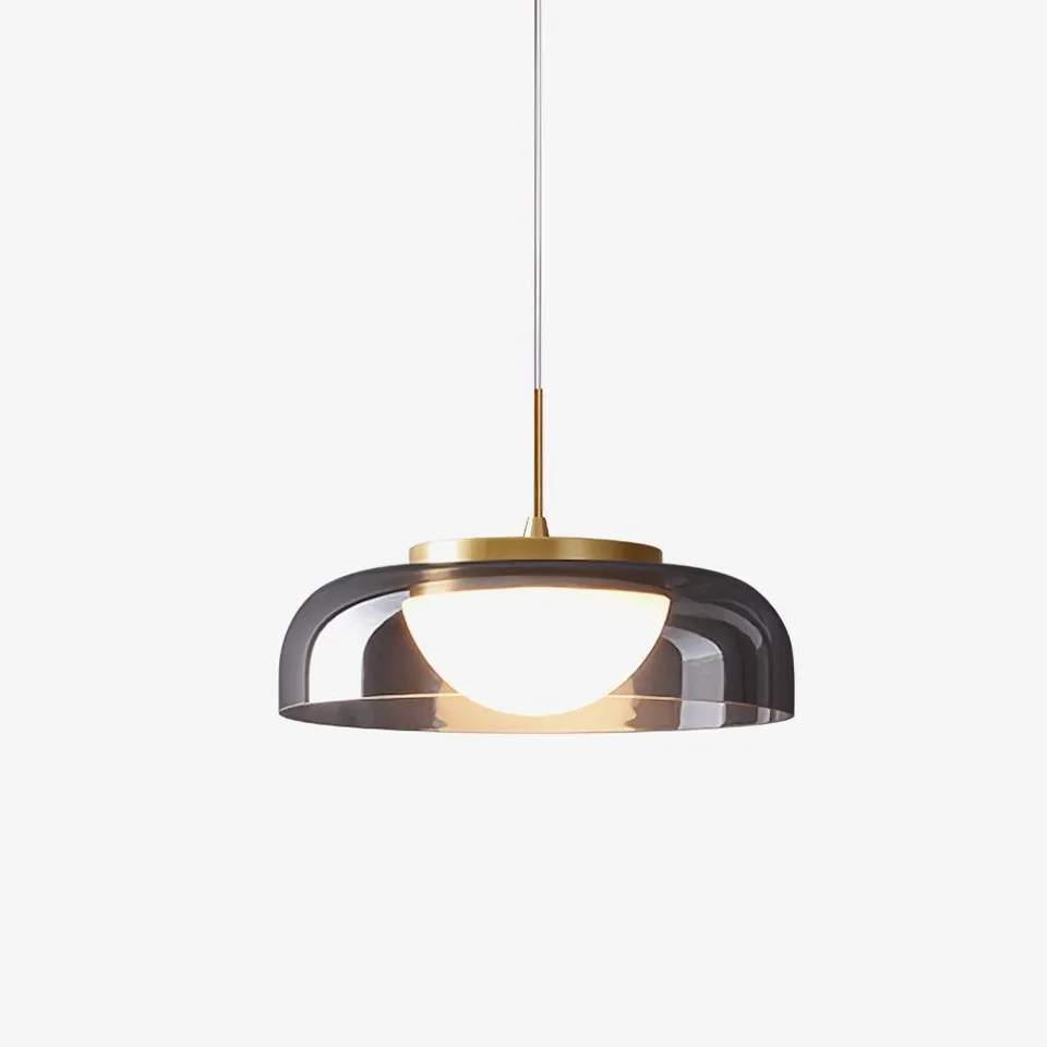 Smoky glass pendant light with a gold disc shade and opal diffuser