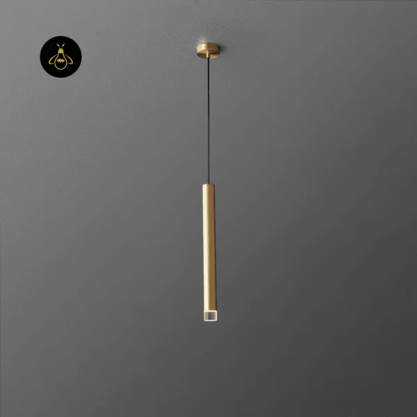 Single gold cylinder pendant light rod with clear LED lens at the tip, hanging from a small gold canopy