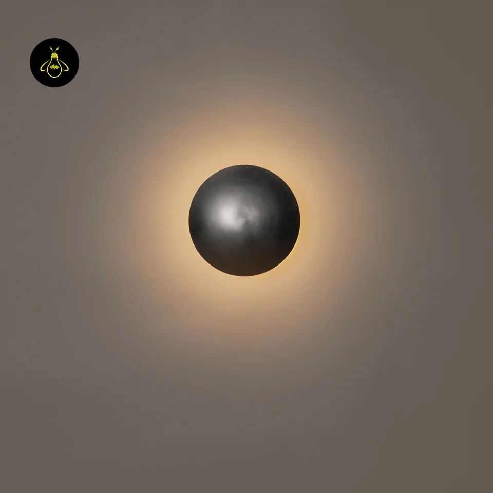 Round LED Wall Light – Satin Nickel Eclipse Disc, 24 cm Warm White Halo 4 Round LED wall light from the front, warm 3000K halo glowing around the satin nickel disc