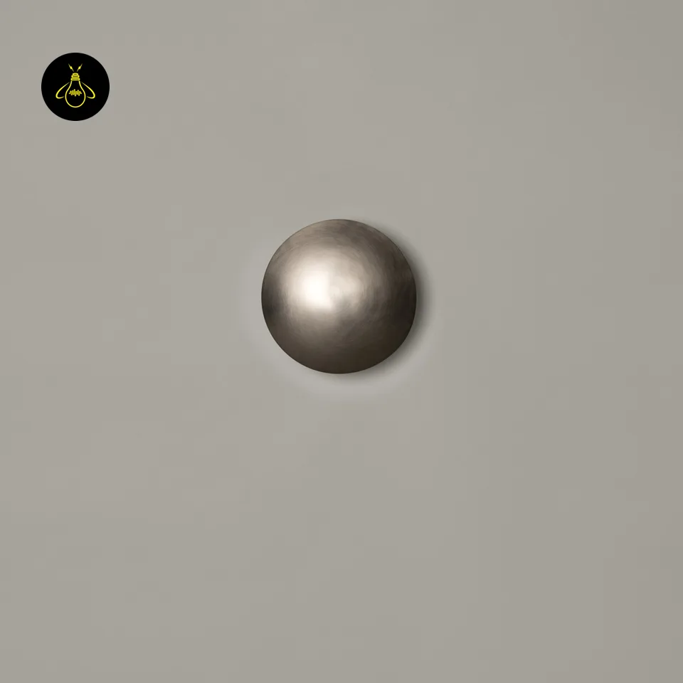 Front view of the round LED wall light, satin nickel stainless steel dome, switched off