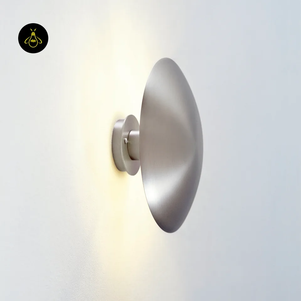 Round LED Wall Light – Satin Nickel Eclipse Disc, 24 cm Warm White Halo 7 Side view of the LED wall light on a white wall, warm light washing out from behind the disc