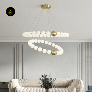 Pearl chandelier lighting a living room with a warm diffused glow over a sofa